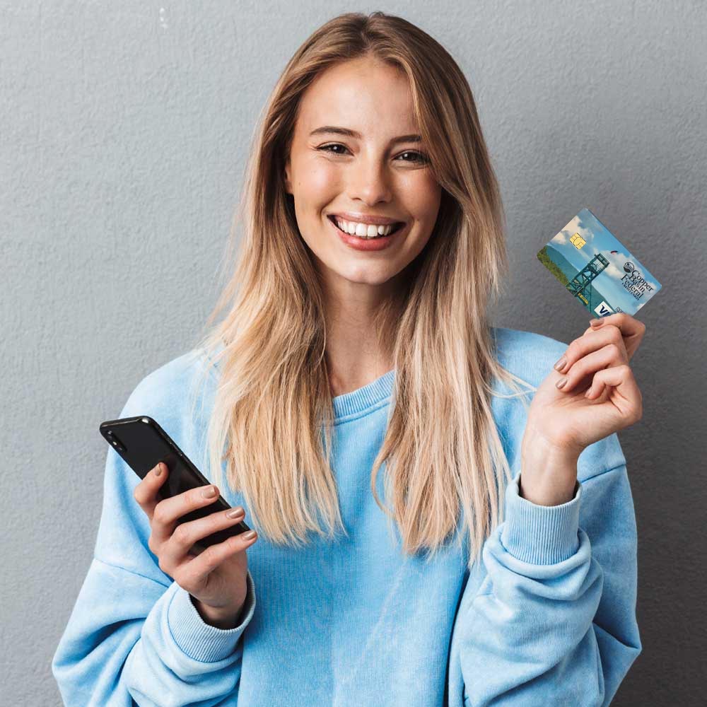 Woman Holding Debit Card